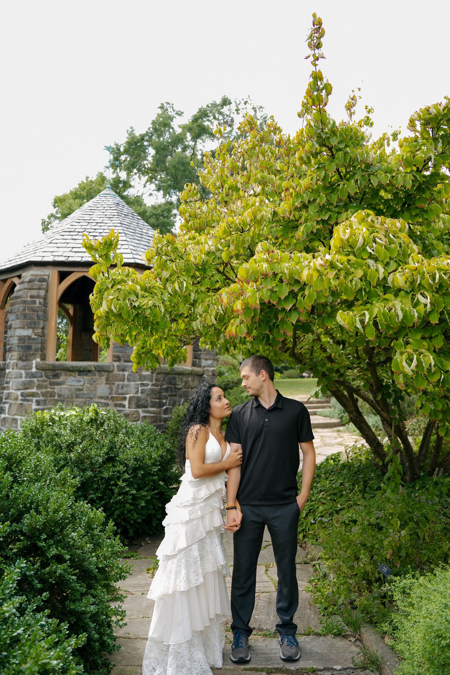 Romantic couple posing outside Washington National Cathedral during a Washington, DC couples photoshoot.