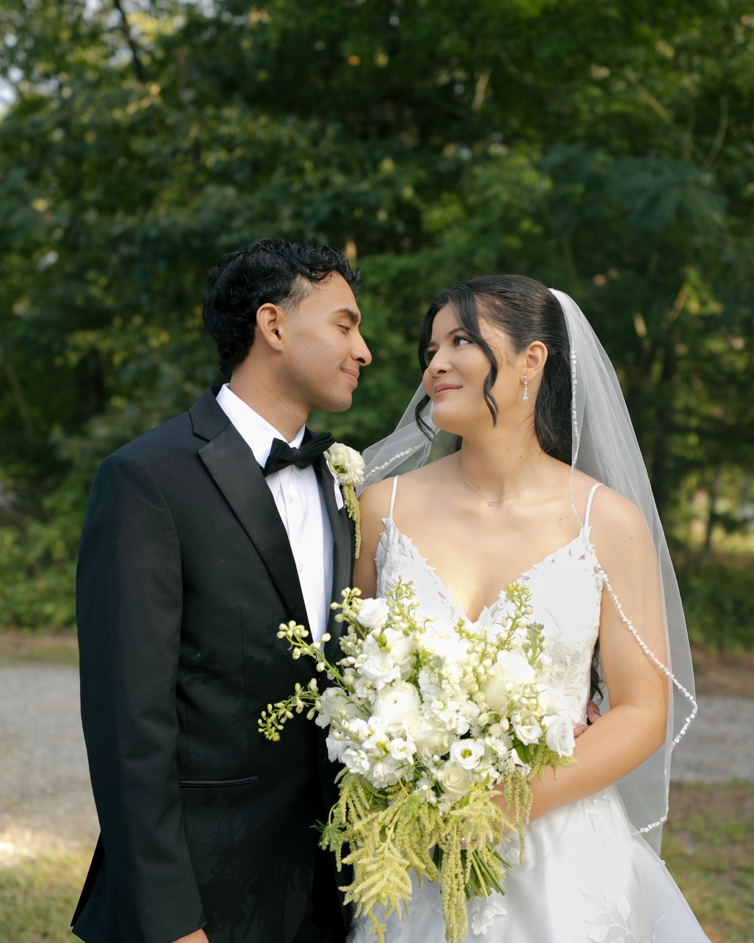 Bride and groom sharing a romantic moment during their wedding day in Maryland, photographed by FebenCollective
