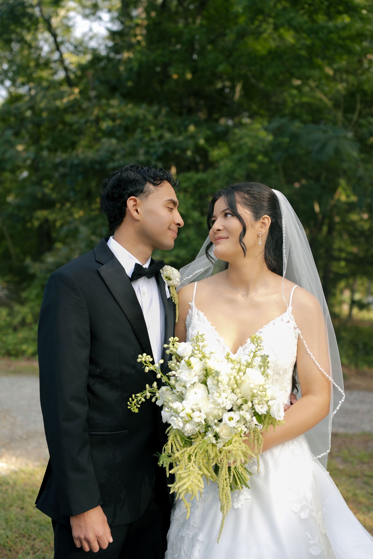 Bride and groom sharing an intimate moment during their Maryland wedding portraits.