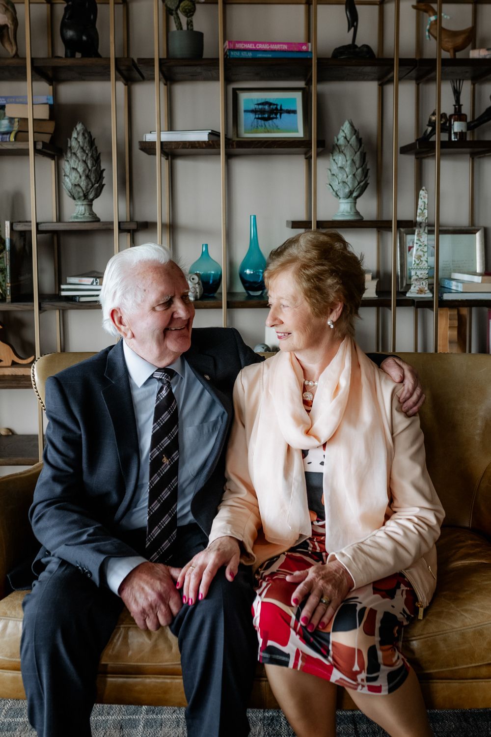 Happy couple marking golden wedding anniversary at Wineport Lodge Athlone, stylish outdoor portrait.