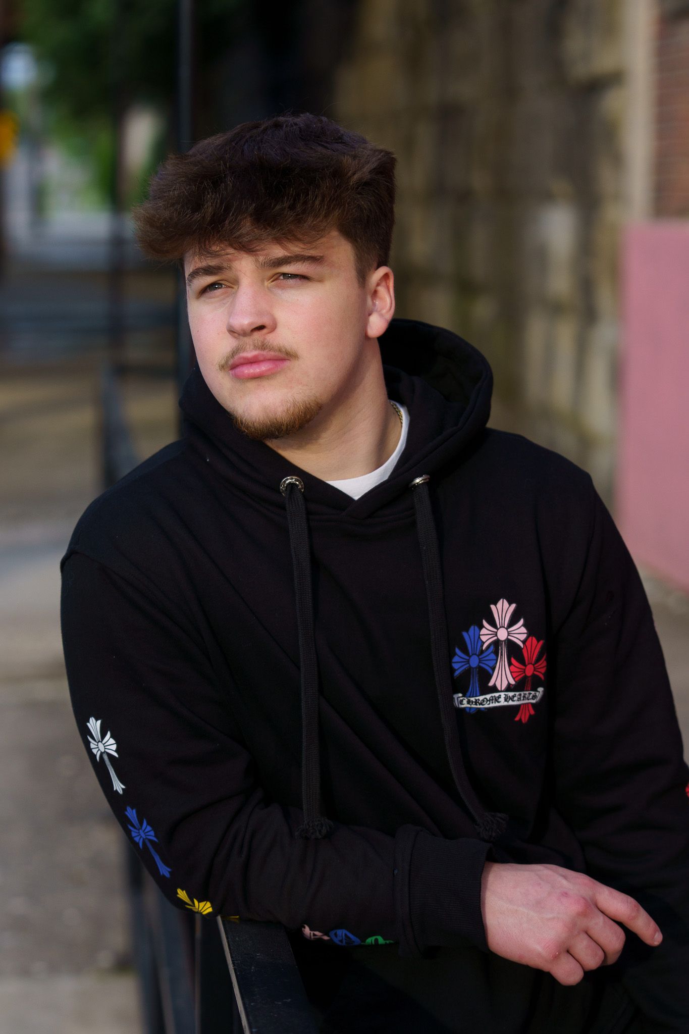 High school senior boy posing outdoors in Columbus, Ohio, photographed by Jamie Macey Photography