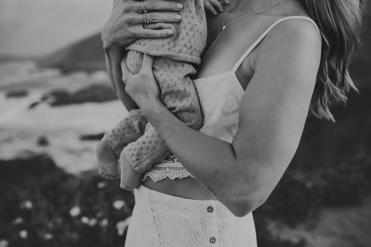 Details of a mother's hands holding her son, photographed by Kristy Baker Photography,