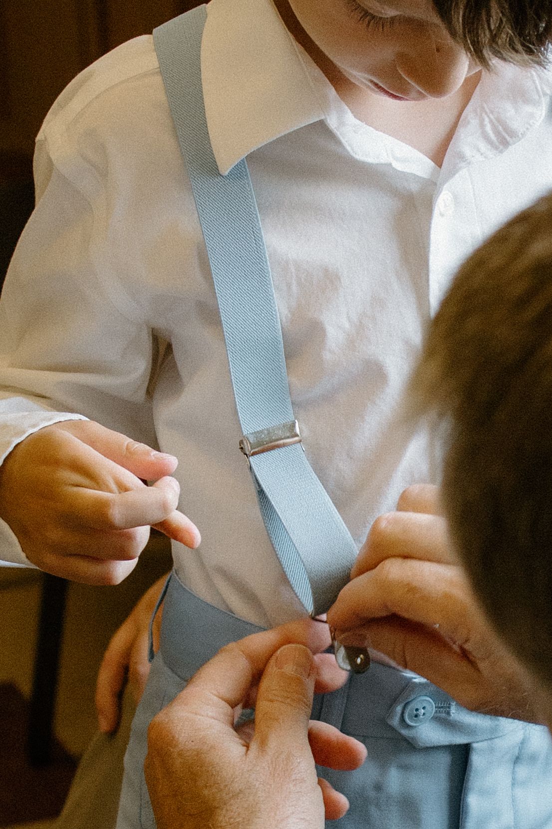 Adorable ring bearer ready to deliver wedding rings at a church wedding in Oklahoma, captured by Oklahoma wedding photographer
