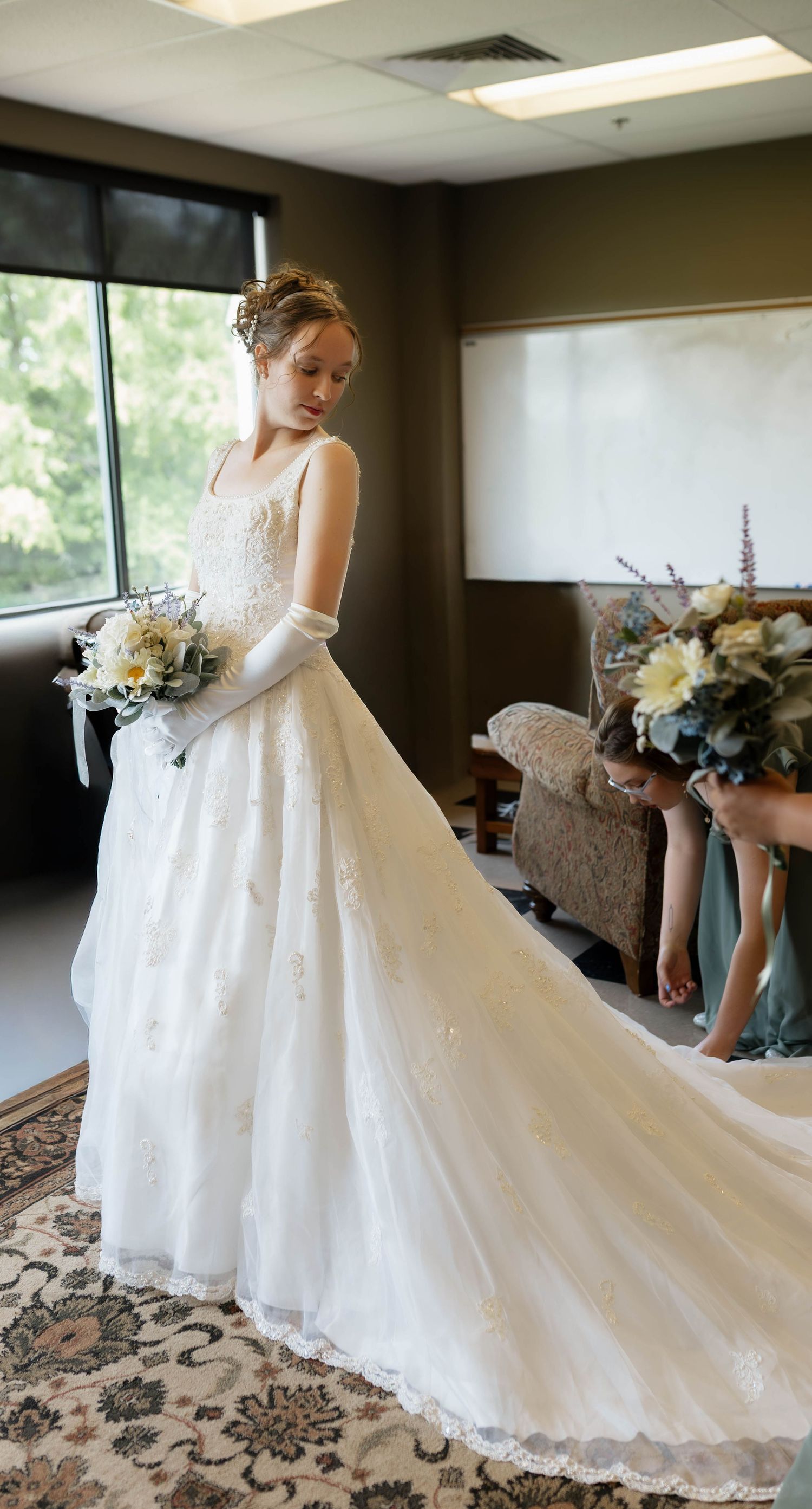 Bride glowing in natural light at Oklahoma church wedding, photographed by Oklahoma wedding photographer.