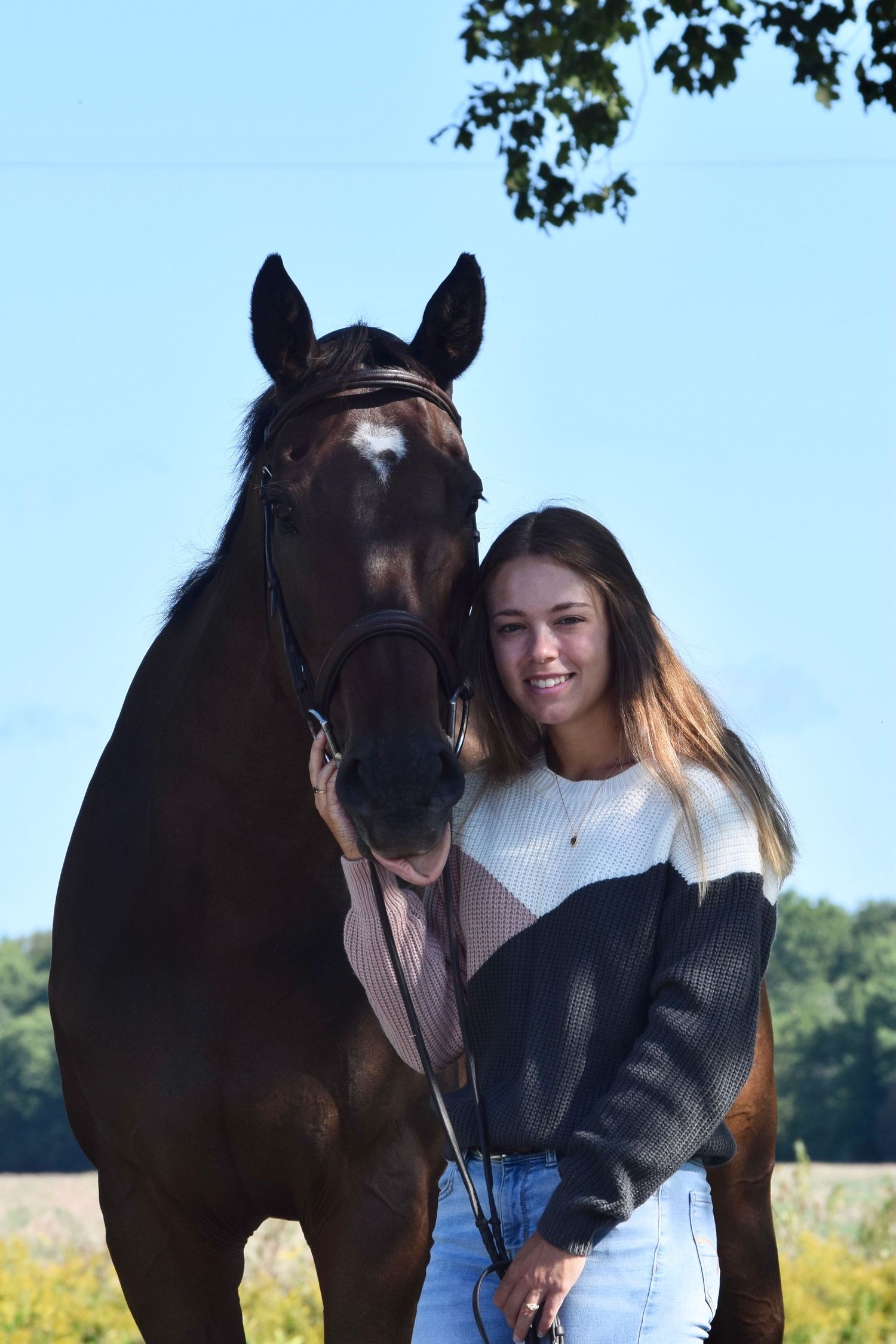 Photo of Bre and her horse.