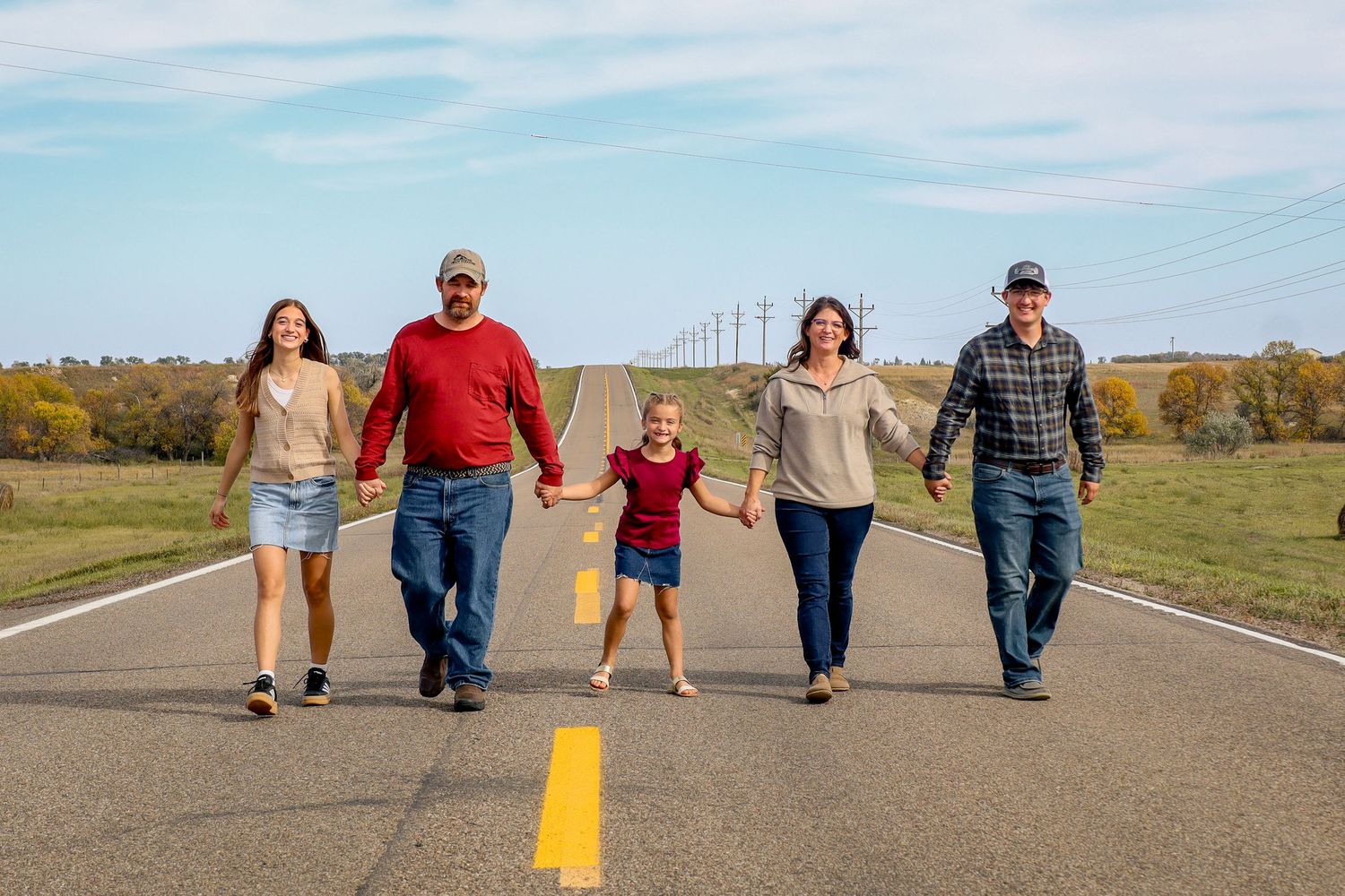 Bismarck family photographer North Dakota Prairie Glow Photography capturing natural family portrait with true-to-color editing.
