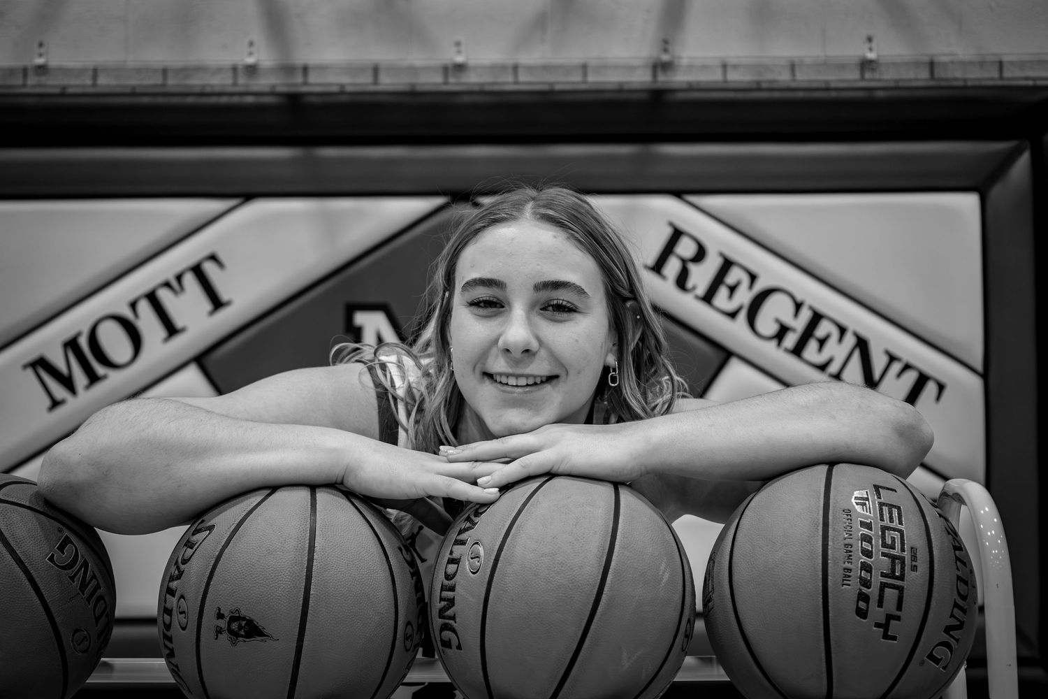 North Dakota senior portrait by Bismarck senior photographer capturing genuine emotion and professional photography style.