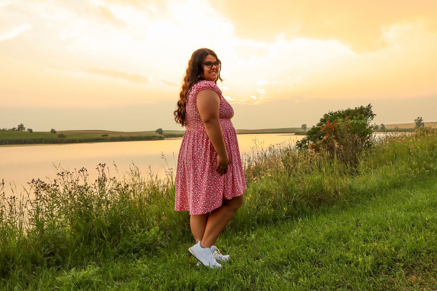 North Dakota senior photographer Prairie Glow Photography creating timeless senior portraits with natural, candid style.