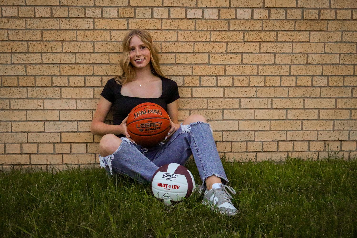 Dickinson photographer North Dakota senior portrait by Prairie Glow Photography with natural expression and timeless editing.