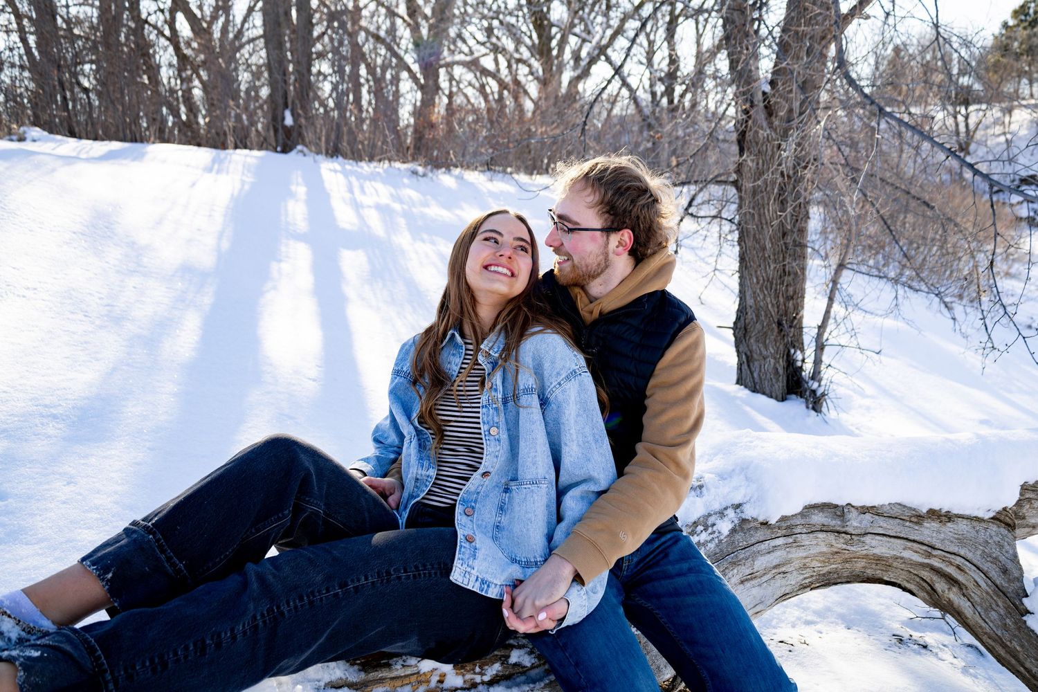 Anna Nasset Bismarck photographer capturing couple laughing together with true-to-color editing and timeless style.