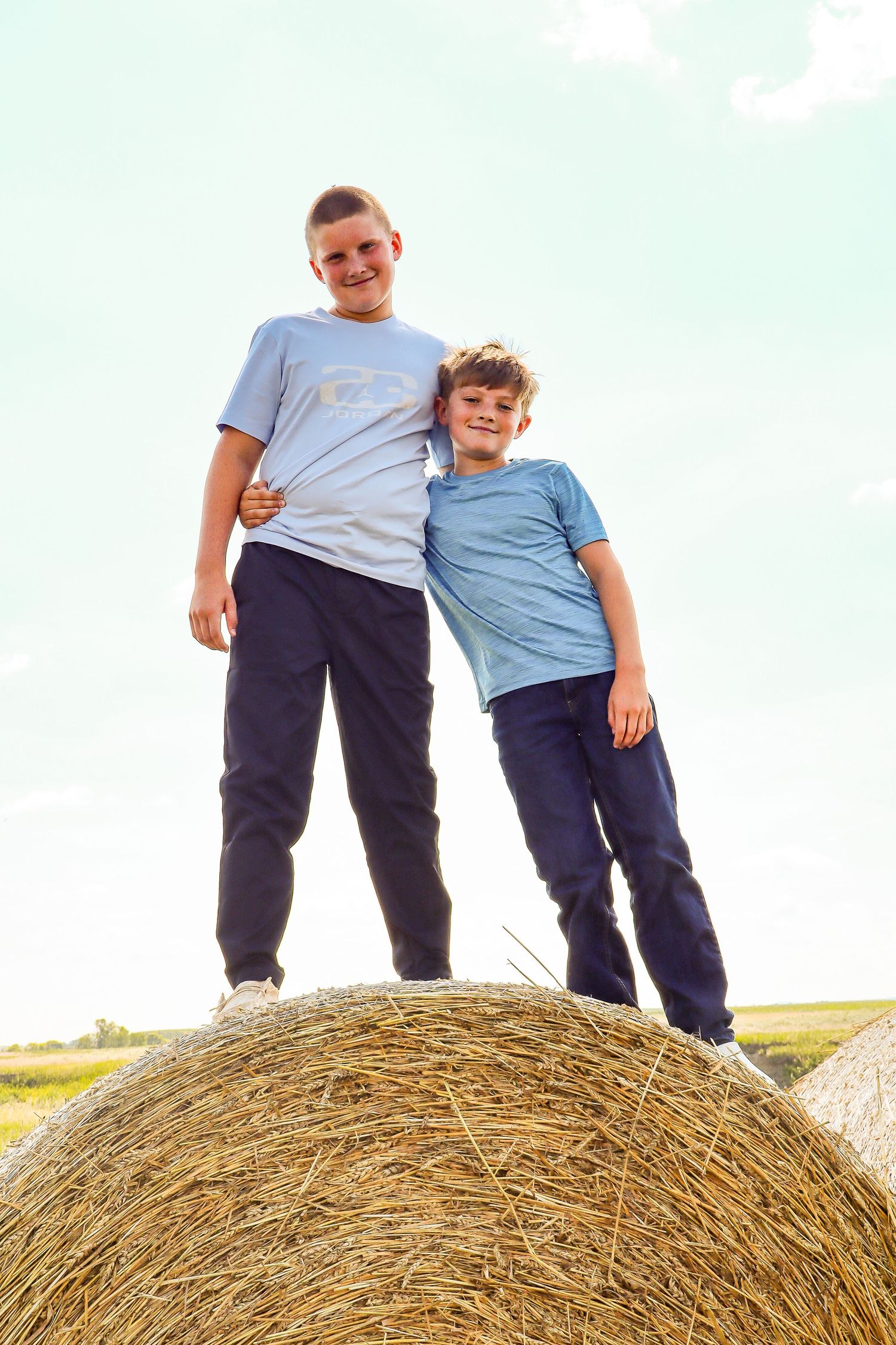 North Dakota family photographer Prairie Glow Photography creating timeless family portraits with natural, candid photography style.