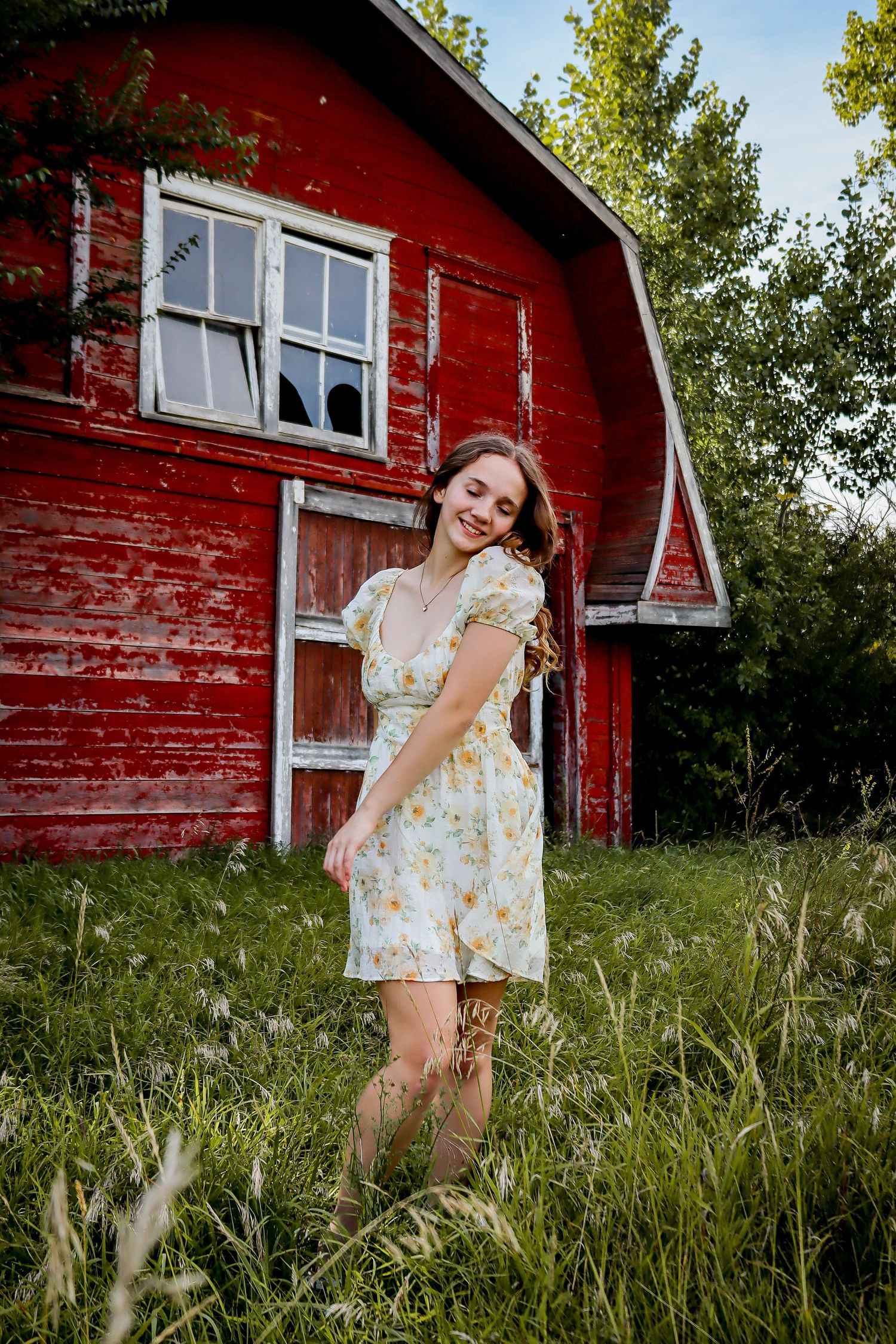 Bismarck photographer North Dakota senior guy portrait outdoors with natural posing and soft golden hour light.