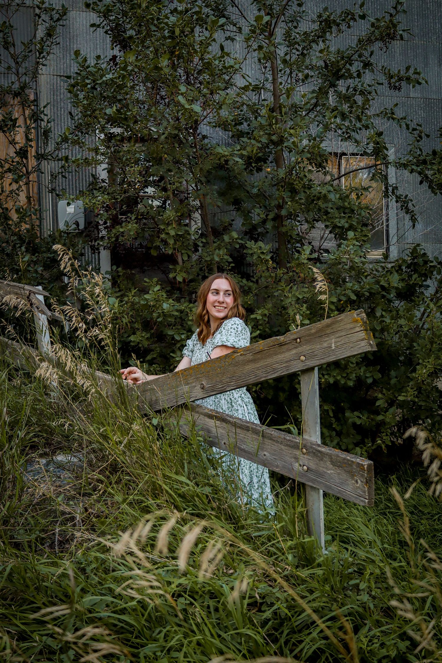 Prairie Glow Photography senior portrait by Bismarck photographer North Dakota with candid movement and storytelling outdoor setting.