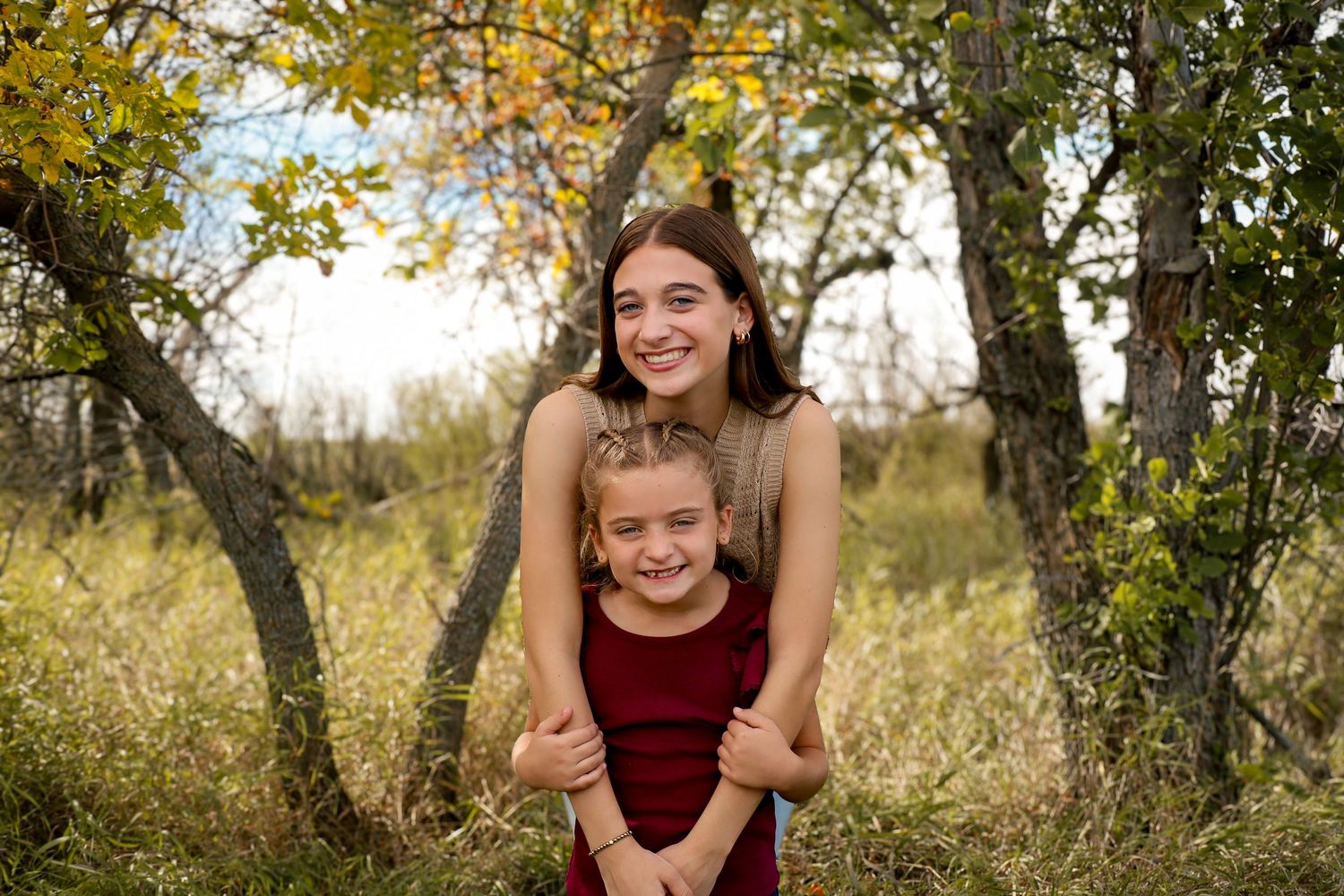 Prairie Glow Photography North Dakota family photographer capturing family portrait with authentic emotion and true-to-color tones.