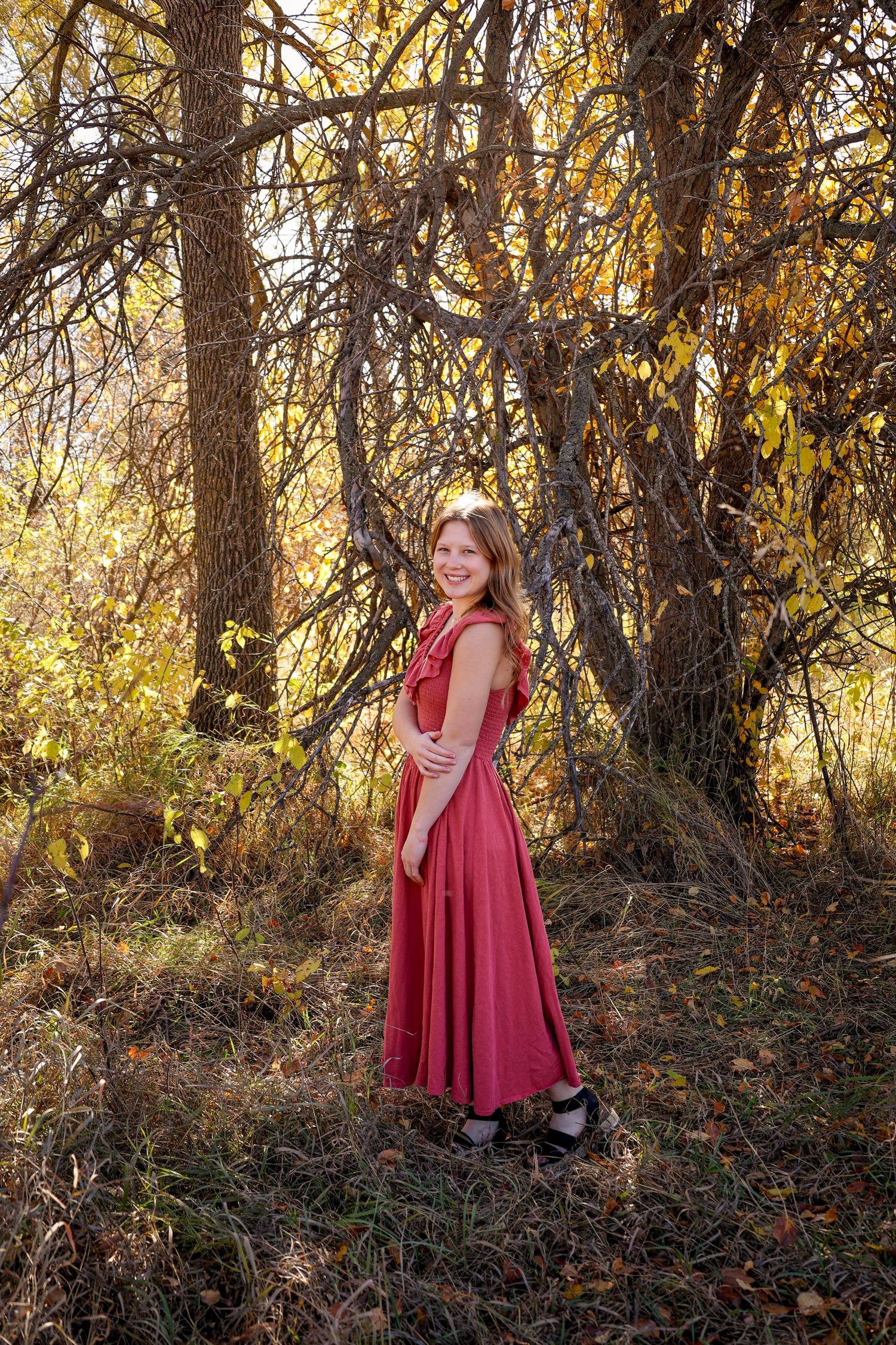 North Dakota senior photographer capturing senior portrait with authentic expression and consistent true-to-color style.
