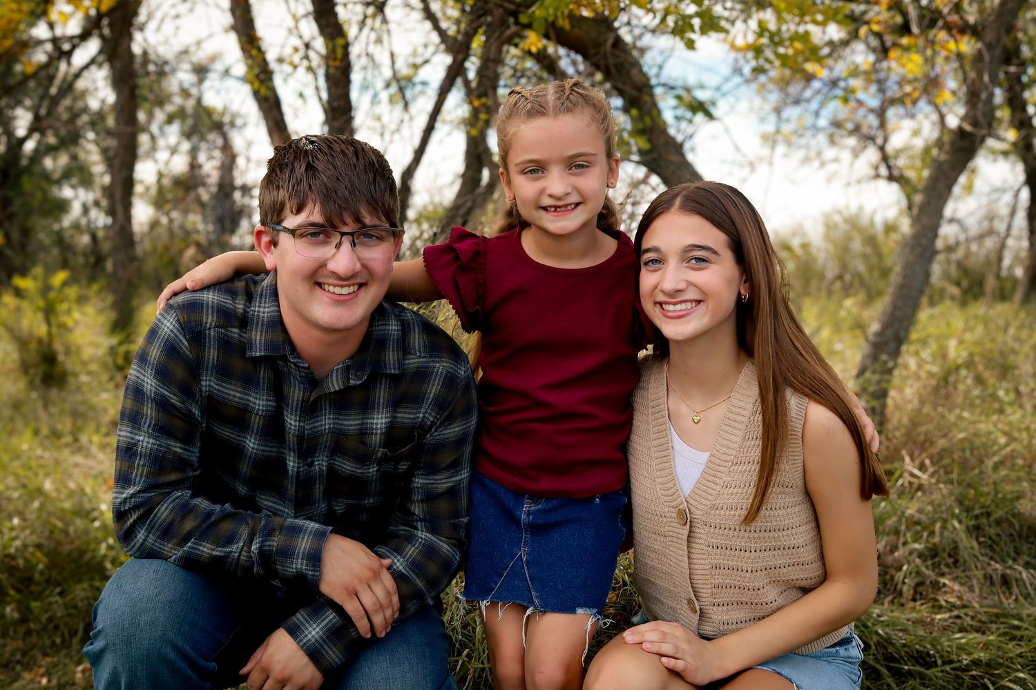 Dickinson photographer North Dakota capturing family portrait with relaxed connection and timeless editing style.