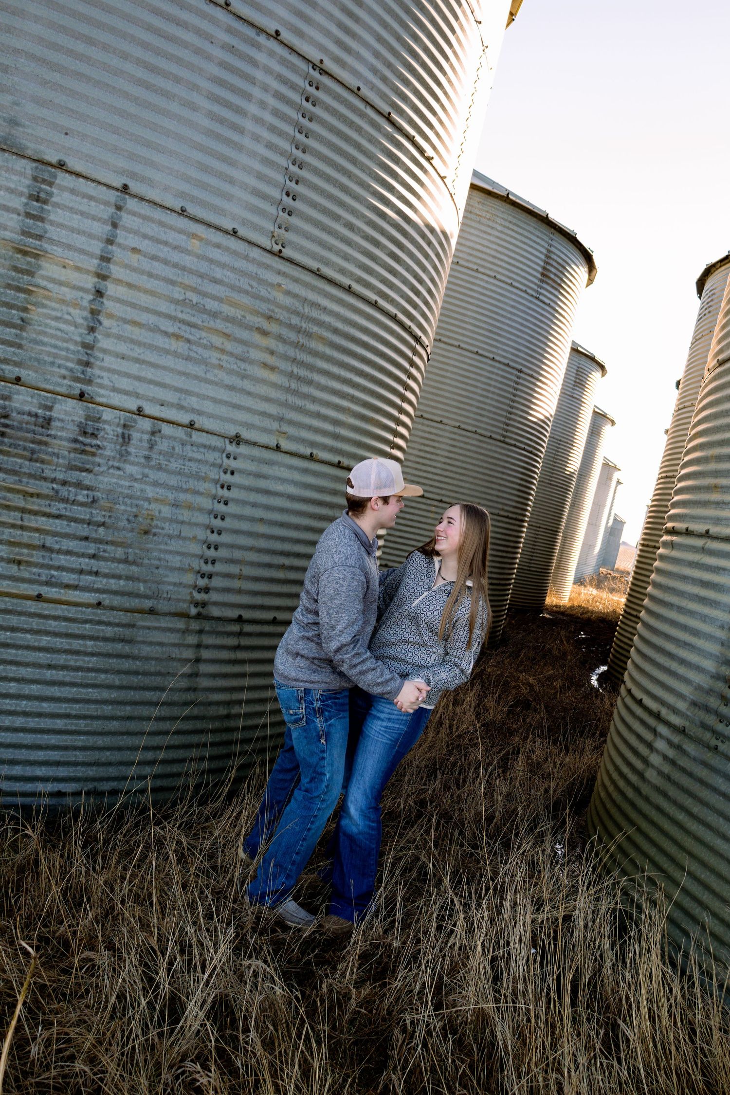 Bismarck photographer North Dakota couples photo with authentic smiles, relaxed posing, and true-to-color editing.