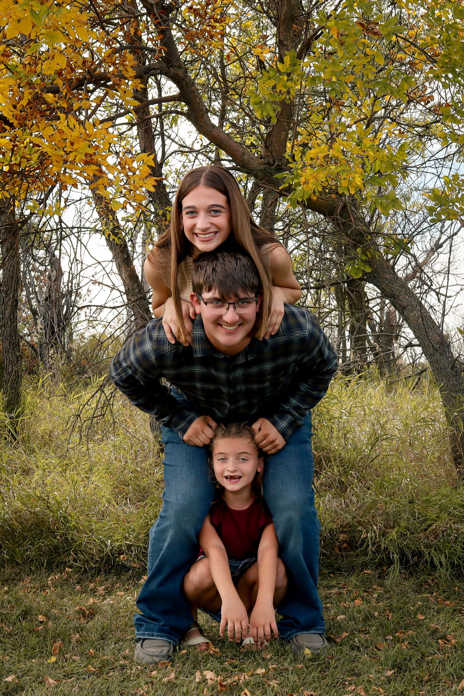 Dickinson photographer North Dakota family portrait by Prairie Glow Photography capturing authentic moments and real emotion.