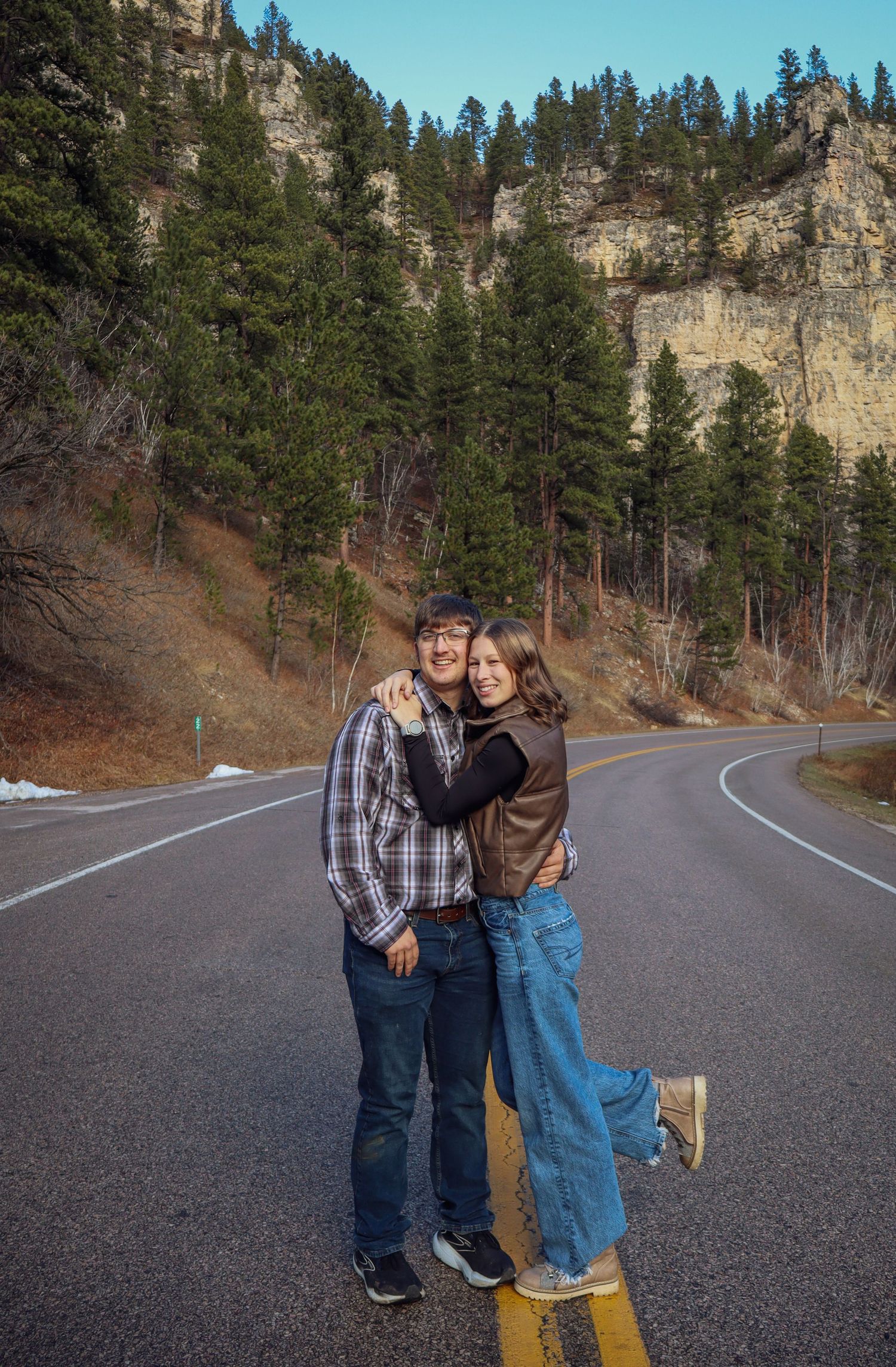 Bismarck photographer North Dakota documenting genuine couple connection in prairie landscape with timeless style.