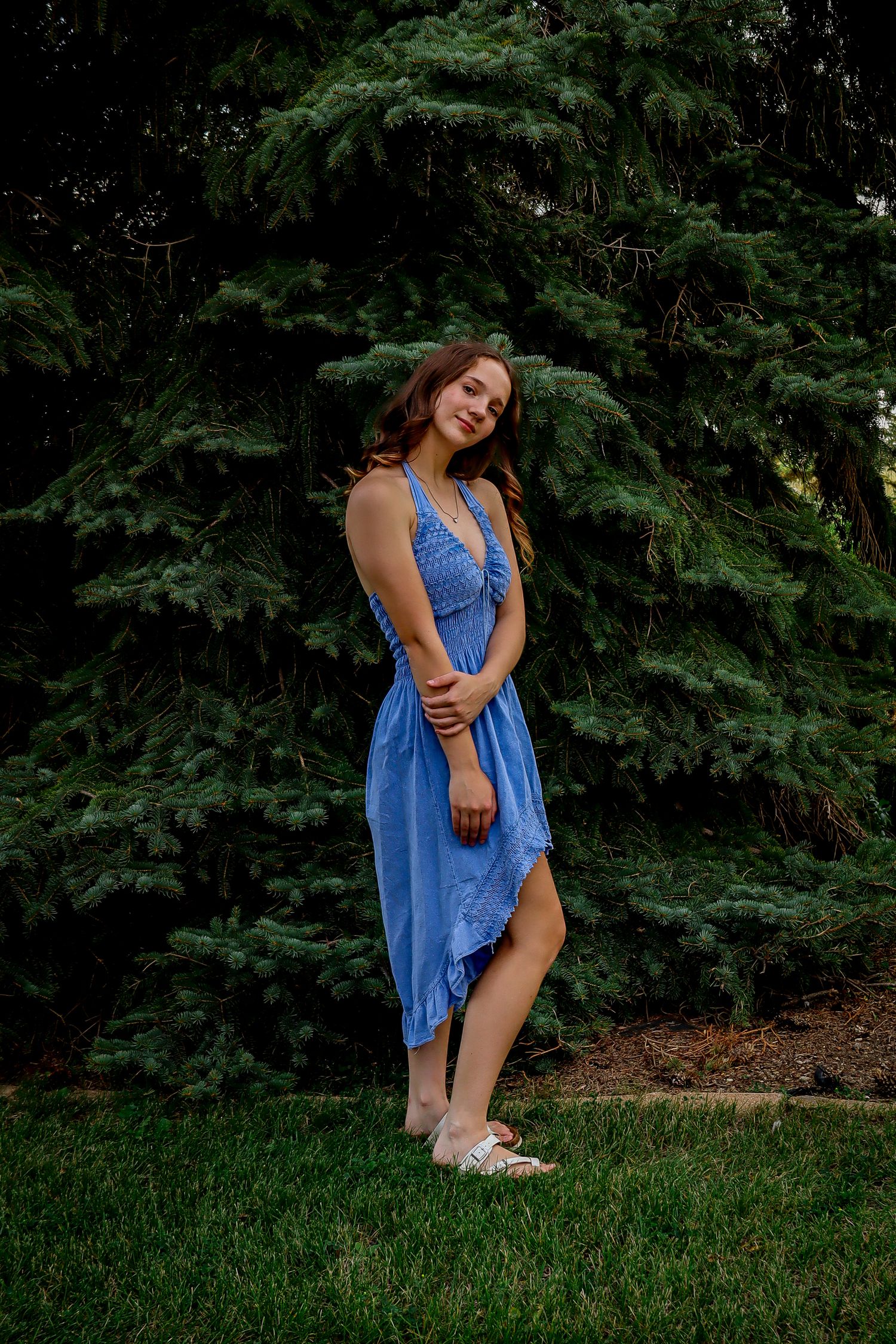 Dickinson photographer North Dakota documenting senior portrait with warm sunset light and genuine smile.