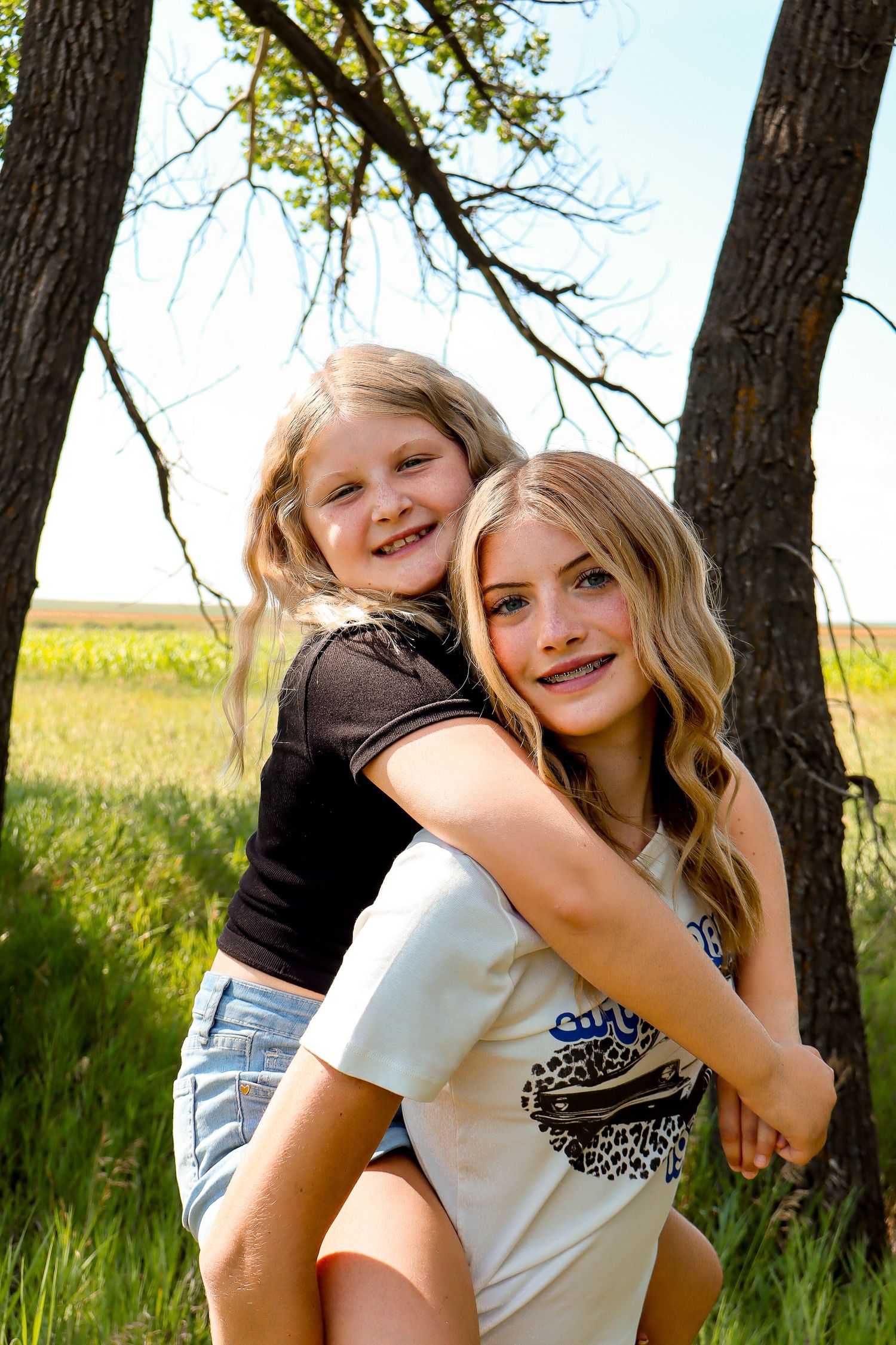 Dickinson family photographer North Dakota Anna Nasset capturing authentic family portrait with candid connection and professional style.