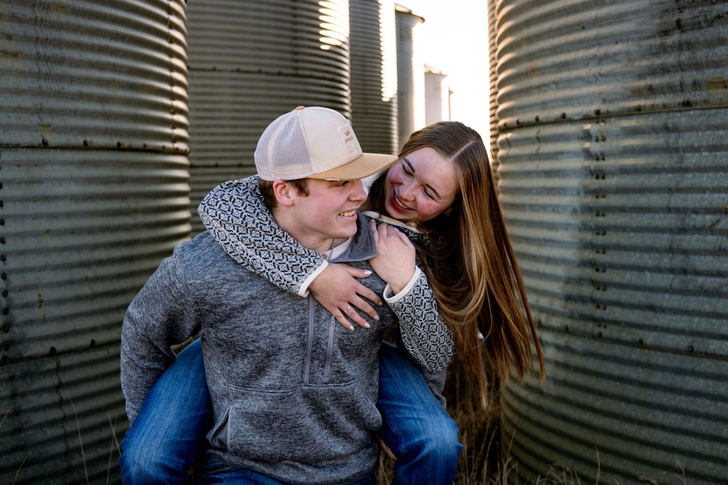 Bismarck photographer North Dakota capturing candid couples portrait with genuine connection and true-to-color editing.