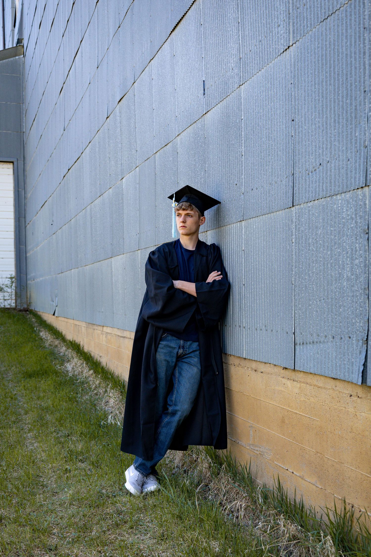 Anna Nasset Dickinson photographer North Dakota capturing senior portrait with natural tones, relaxed posture, and real emotion.