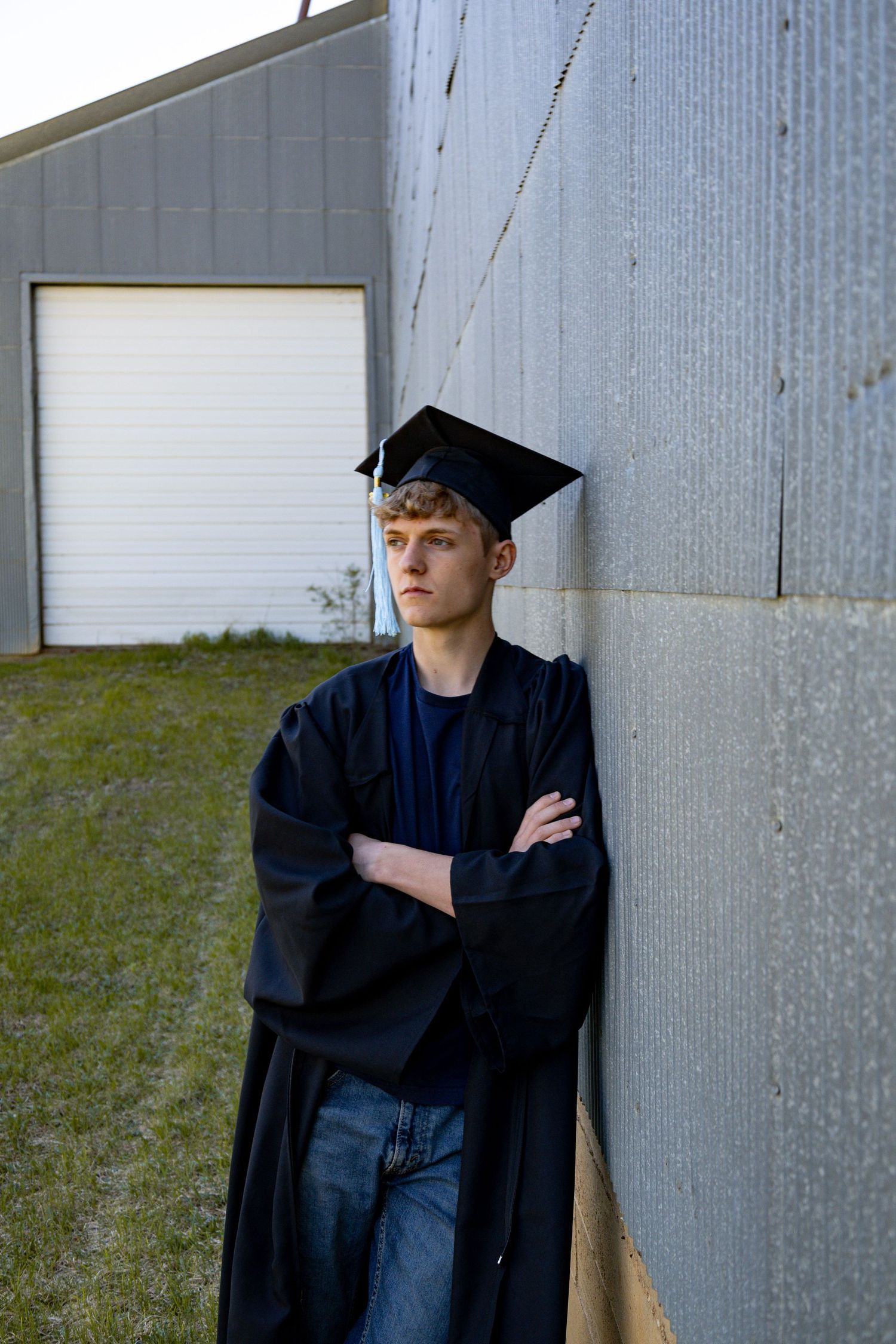 Prairie Glow Photography Bismarck photographer North Dakota senior photo featuring relaxed pose and genuine personality in natural light.