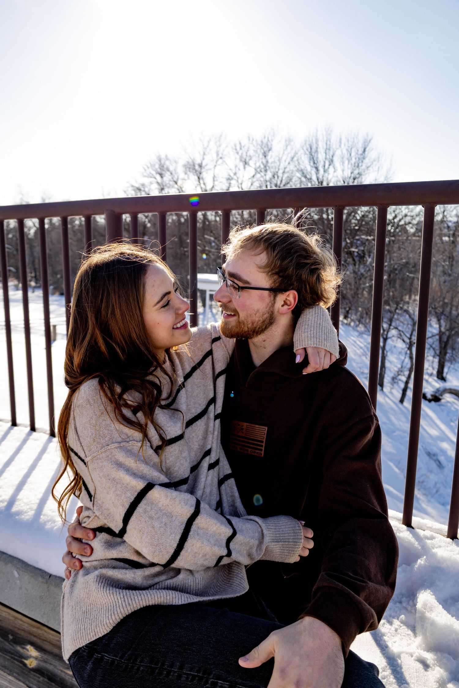Bismarck photographer North Dakota capturing engagement photos with natural posing and genuine emotional connection.