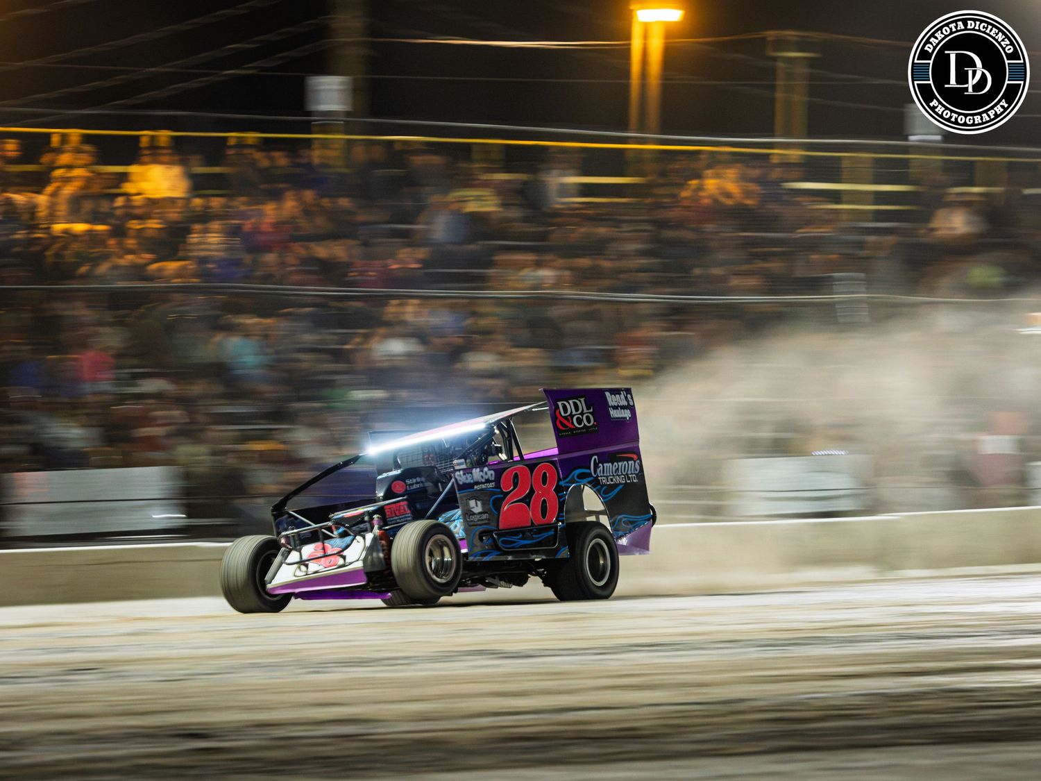 Todd Gordon in his 358 crusing down the front stretch