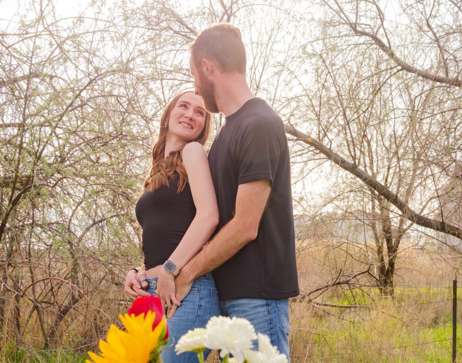 Romantic couple holding hands during engagement session in Northern Utah mountains