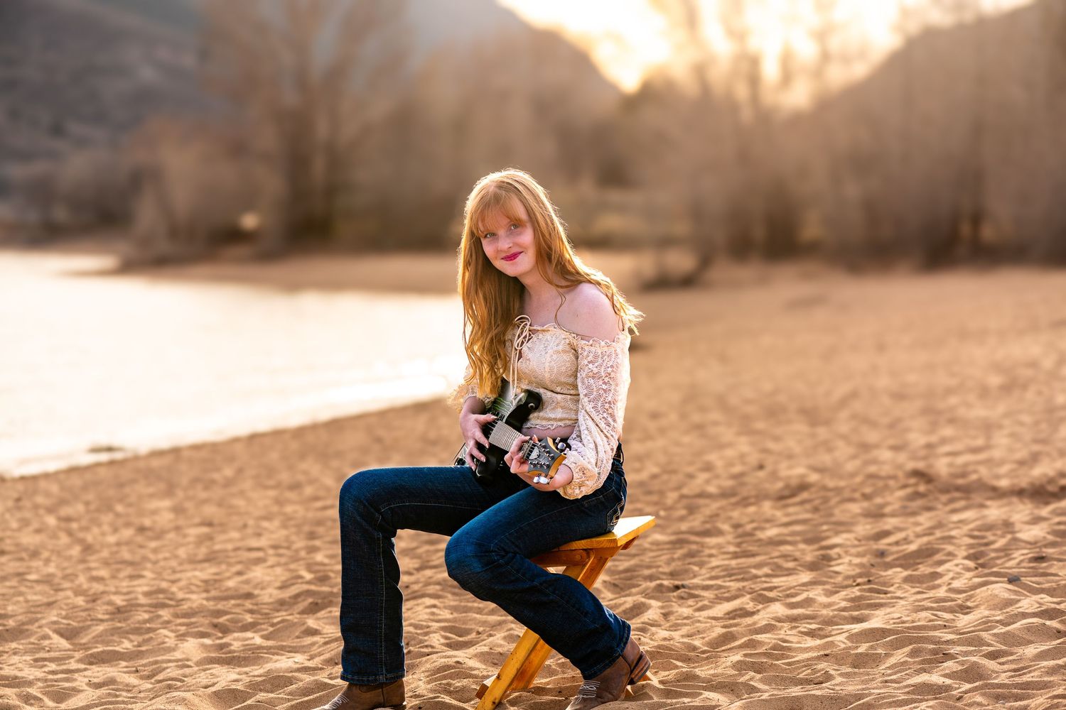 Fall senior photos in Northern Utah with colorful autumn leaves and high school senior