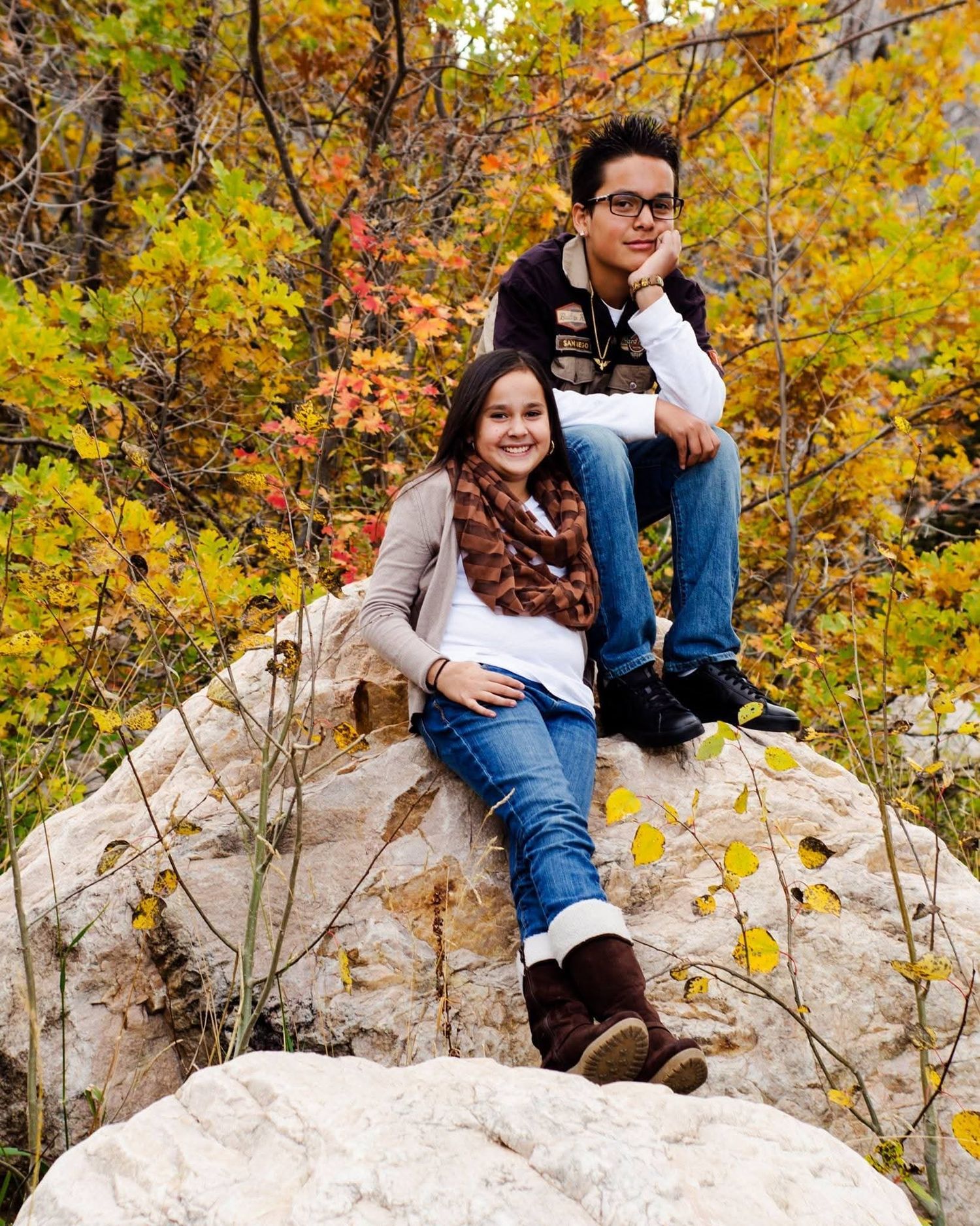 Candid family moment with parents and children laughing during Northern Utah photo session