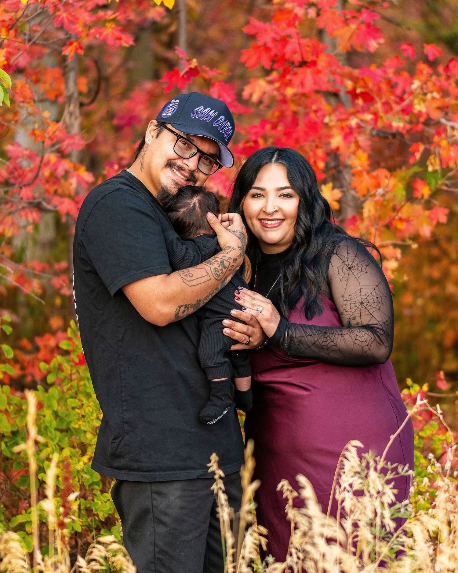 Northern Utah engagement photographer capturing romantic couple in vibrant fall foliage outdoor session
