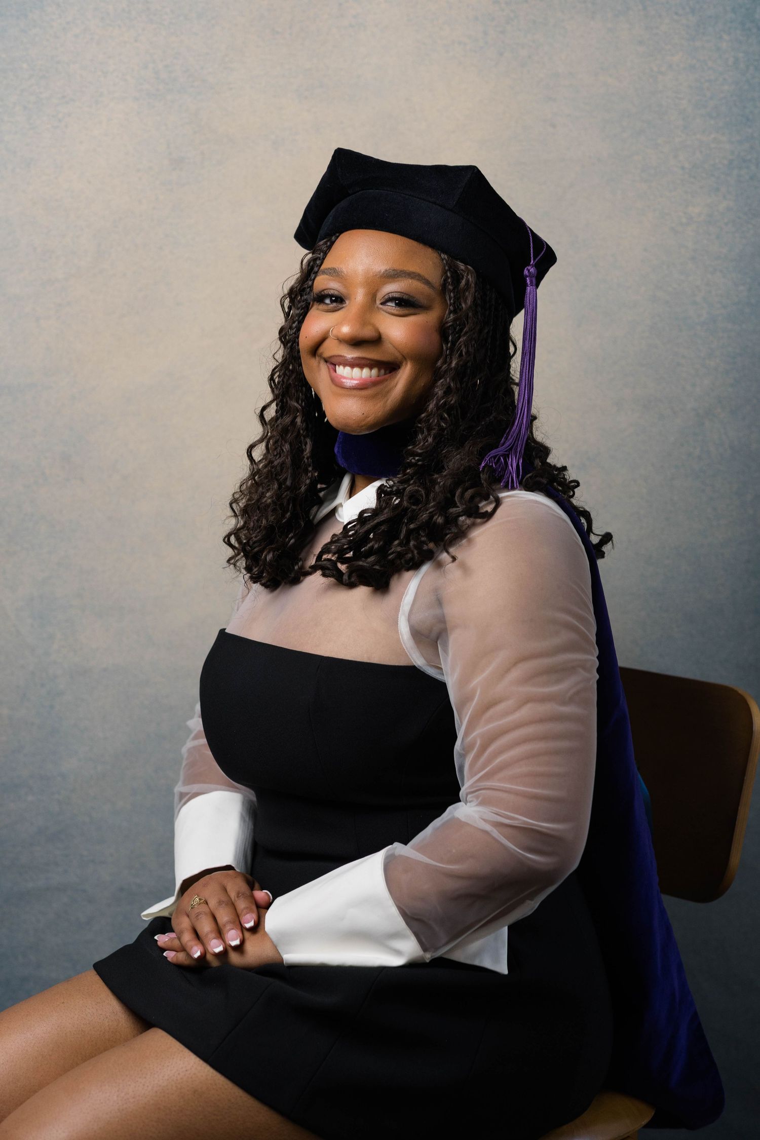 A studio portrait of a graduate.