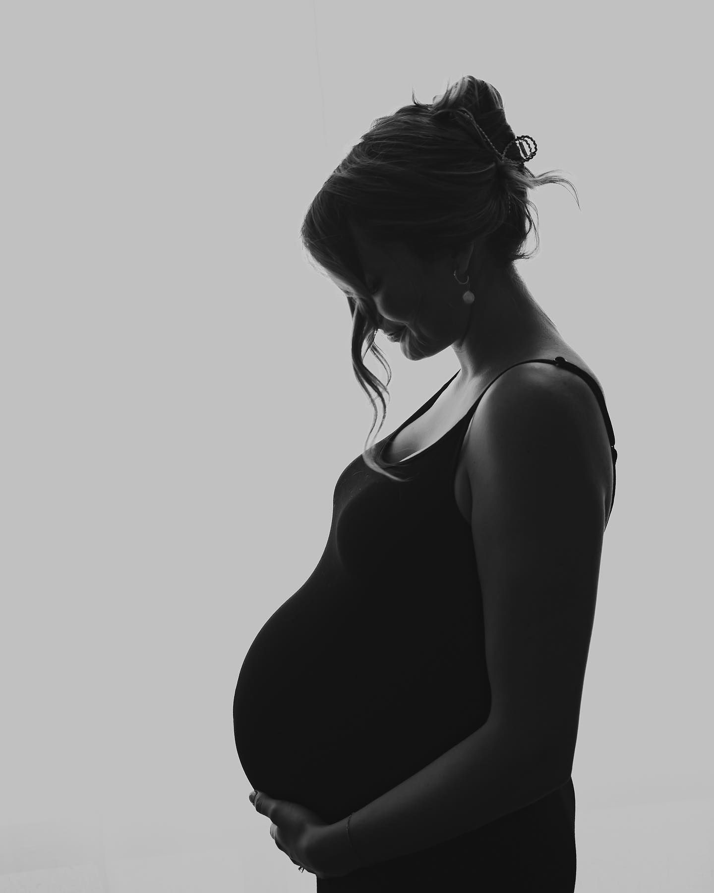 Artistic black and white silhouette portraits in minimalist style.