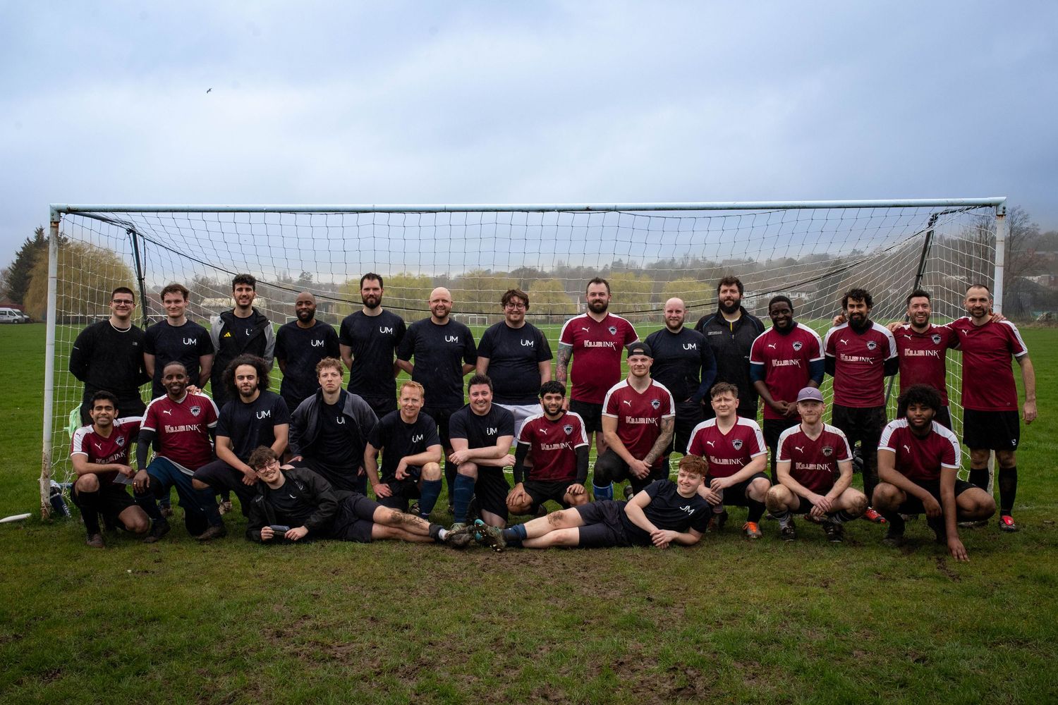Football team group photo on pitch with squad lineup in Wembley, London, UK