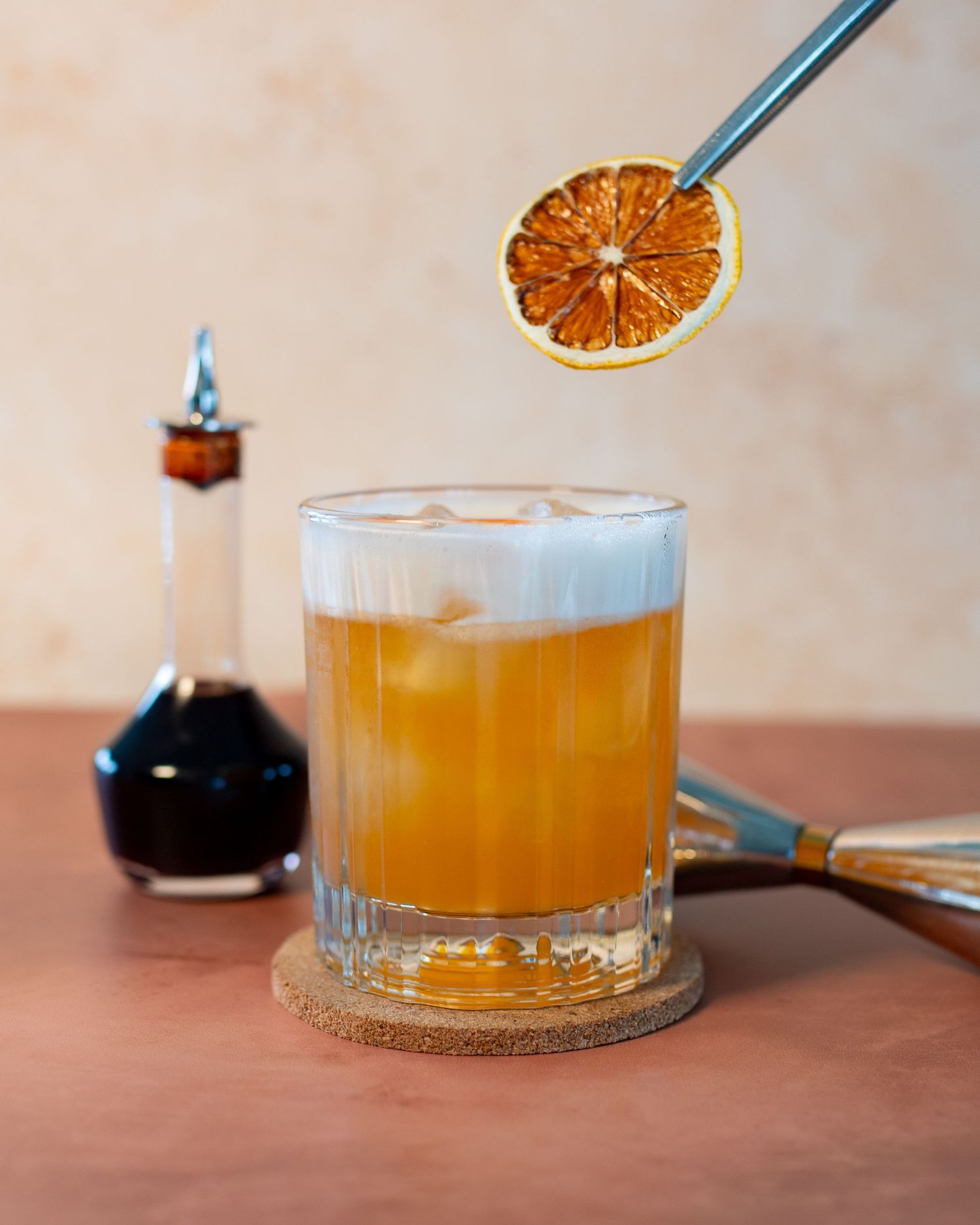 Cocktail drink being prepared with garnish in food and drink photography at Heathrow, London, UK