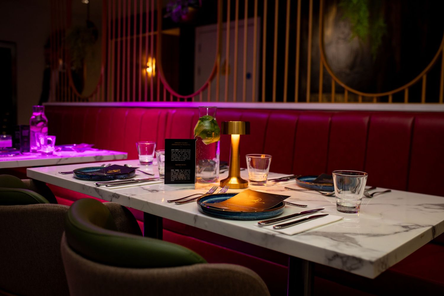Restaurant interior setup with table dining arrangement and ambient lighting in Heathrow, London, UK