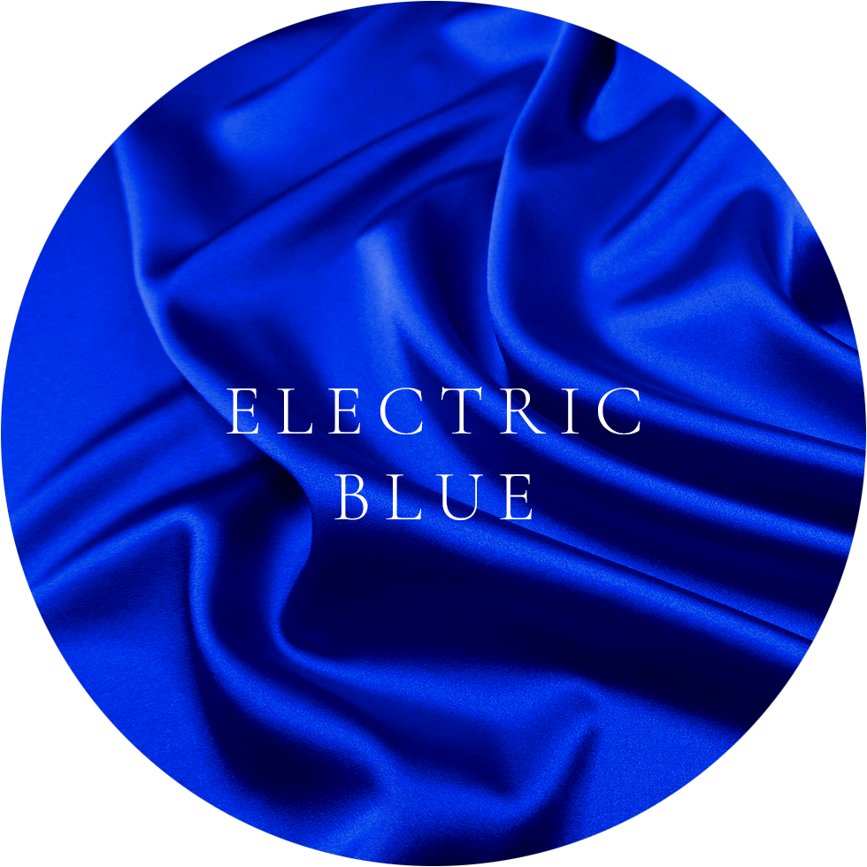 Ottawa Flying dress showcases color Vibrant electric blue satin fabric with rich sheen and flowing draped folds.