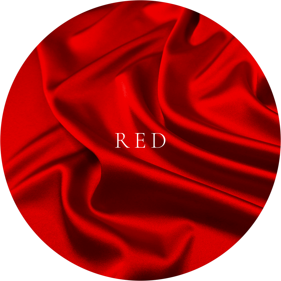 Ottawa Flying dress showcases color Vivid red satin fabric with glossy sheen and dramatic flowing folds.