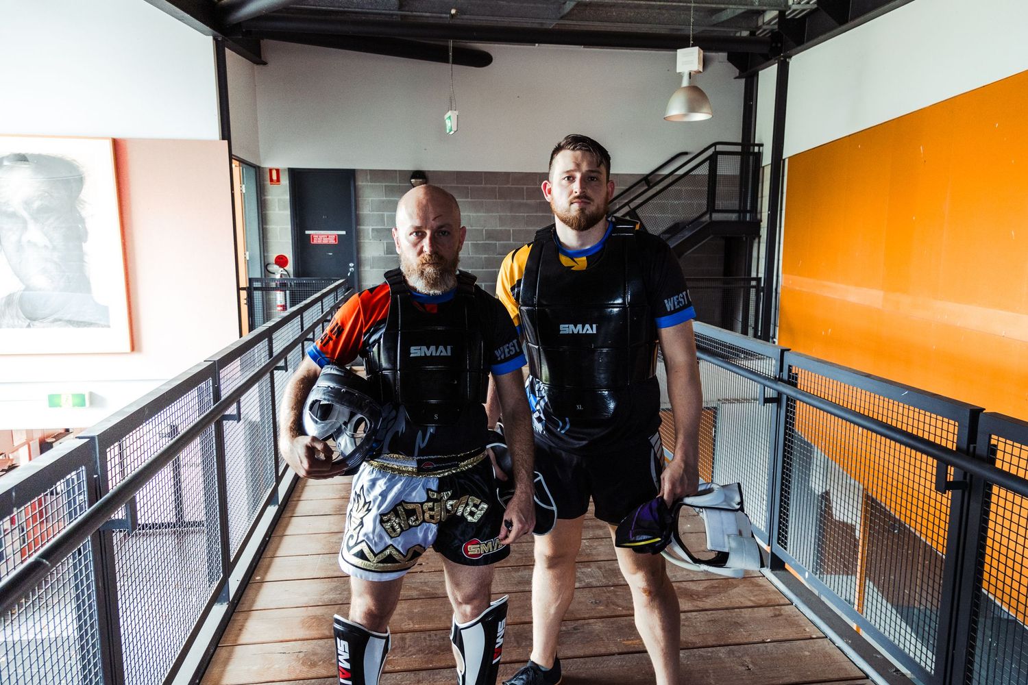 Icy Mike and Sensei Seth from YoutTube standing on set of the Ultimate Self Defence Championship during season 1.