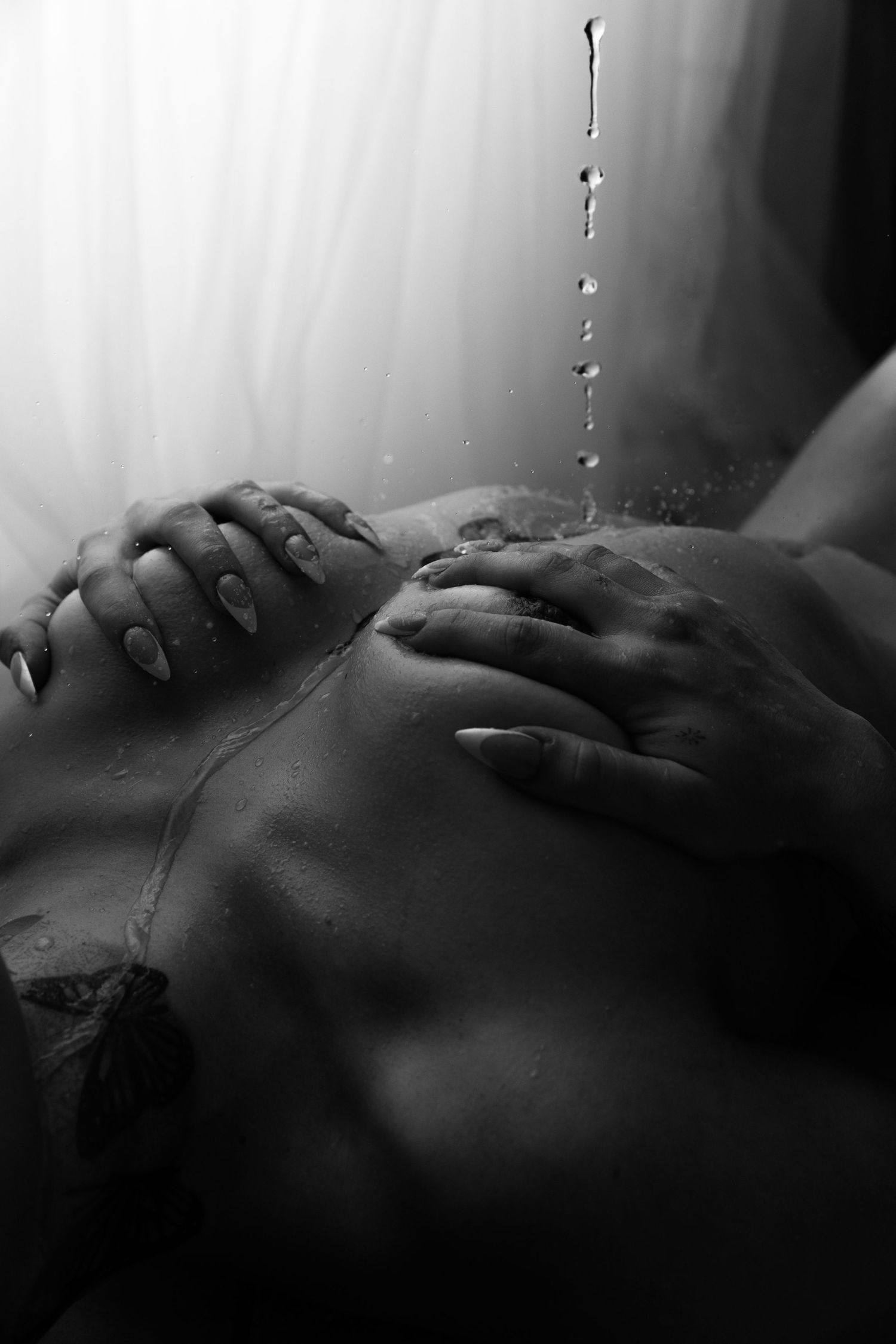 Dramatic black and white photography with artistic lighting and shadow play.  Located in Palm Desert, California.