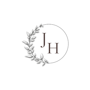 Elegant JH monogram logo with botanical leaf wreath circle border in minimalist black and white design.