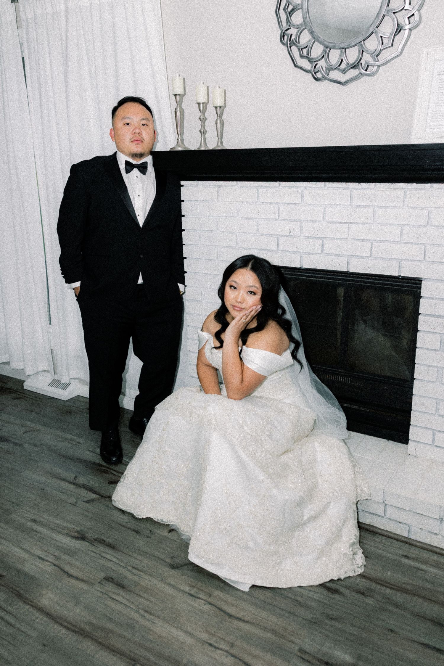 Wedding photography sequence showing playful poses on a hardwood floor against white brick walls.