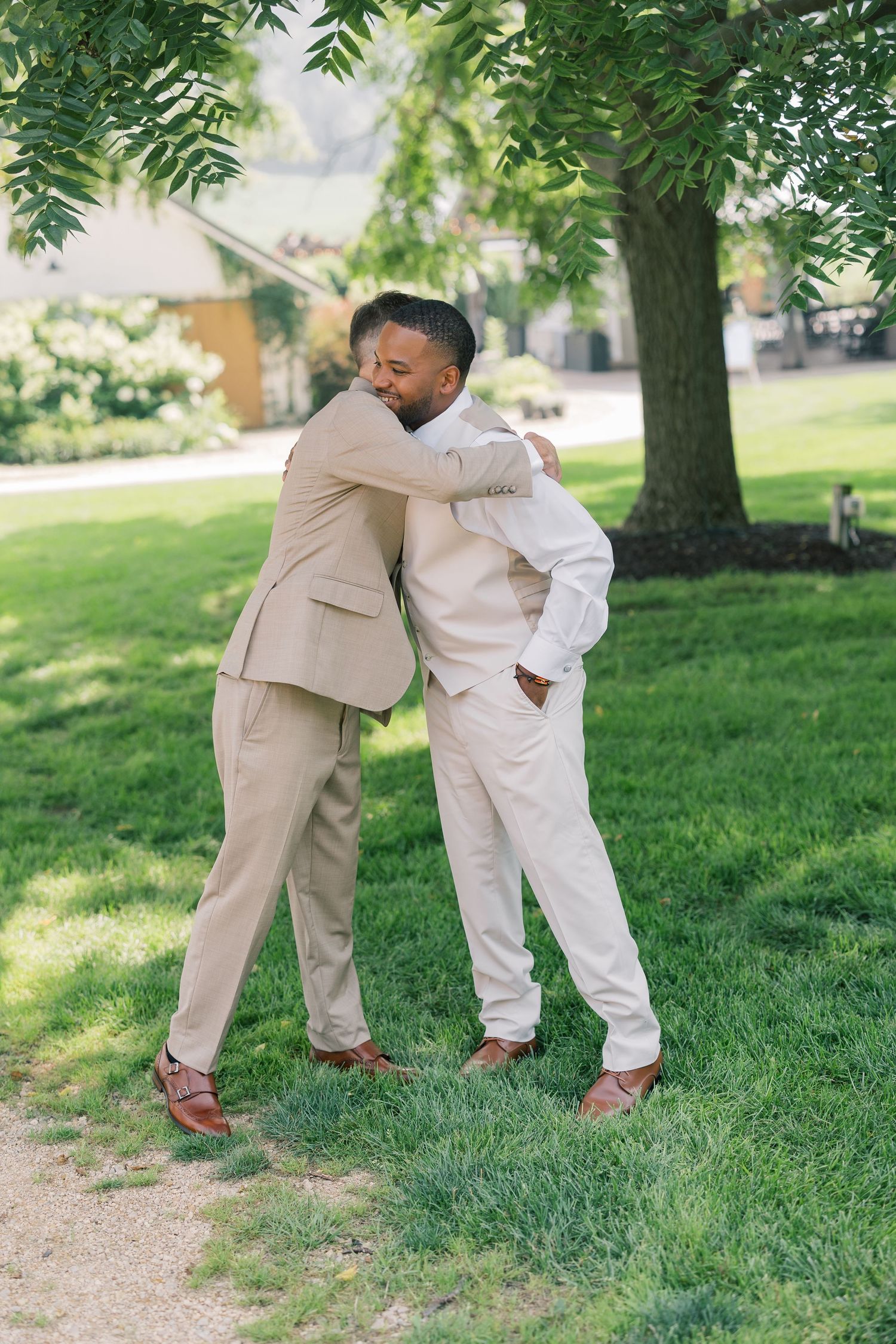 Candid sequence shows two people in coordinated outfits dancing together on green grass.