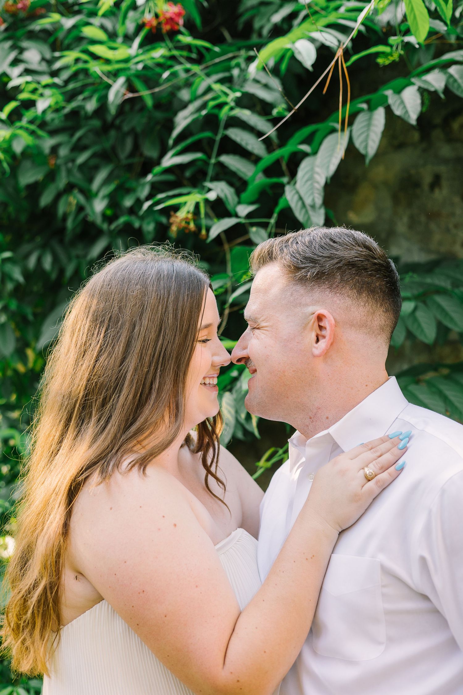A romantic couples session in a picturesque setting, highlighting the genuine connection and warmth between the couple. 