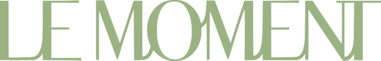 Le Moment logo in soft sage green serif typography on a clean white background.