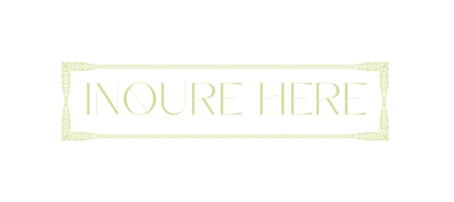 Elegant art deco style inquire here button with decorative border on dark background.