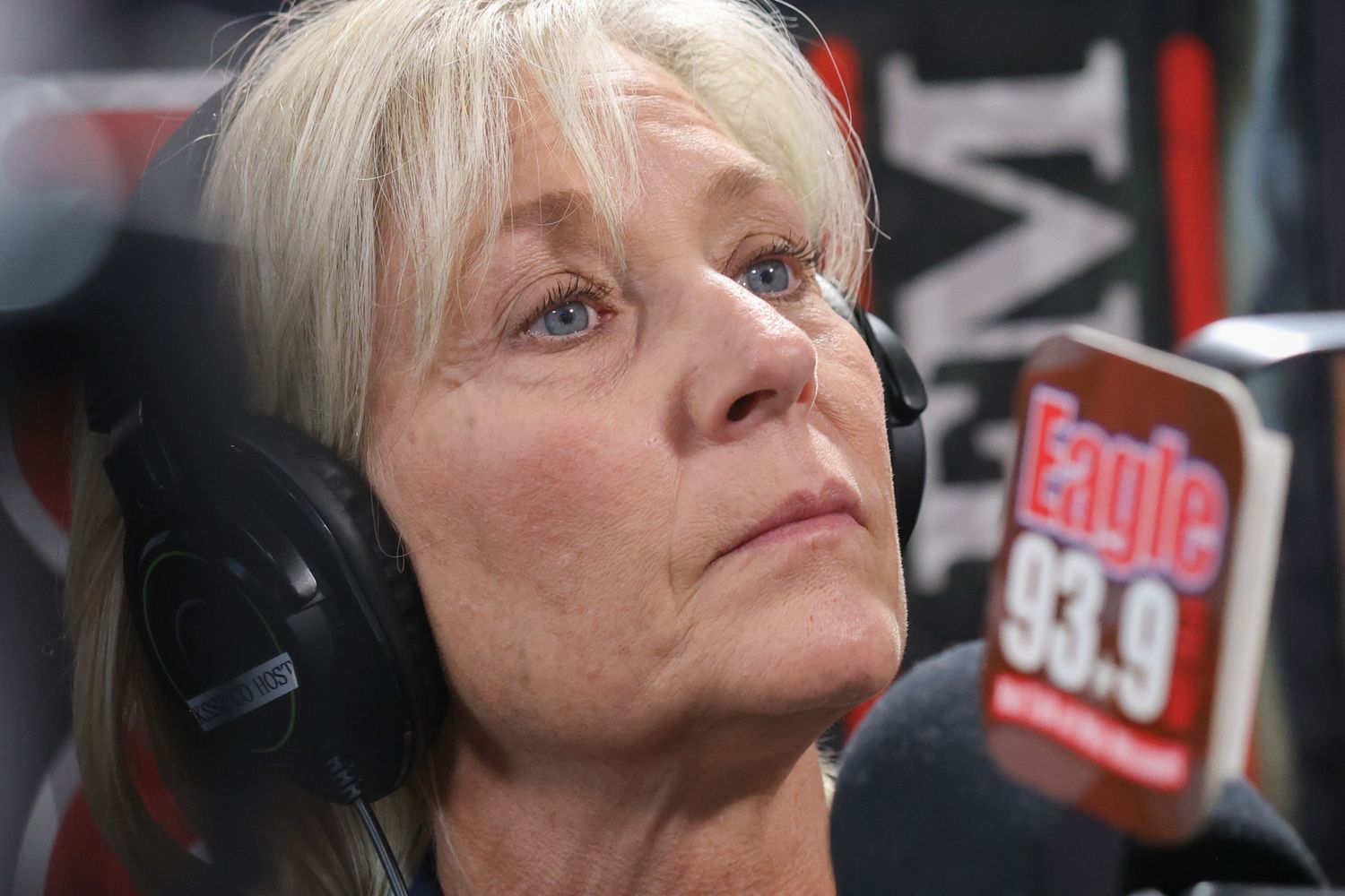 Amy Hess listens to people talk about guns while on the “Gary on Guns” show